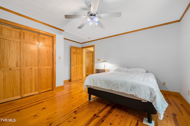 198 Gunbarrel Ln, Butler, TN 37640 - bedroom featuring crown molding, baseboards, light wood-type flooring, and ceiling fan