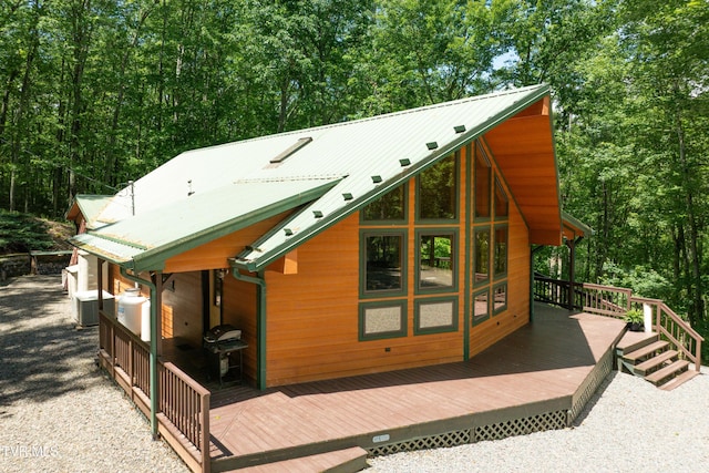 198 Gunbarrel Ln, Butler, TN 37640 - view of side of property featuring a deck and metal roof