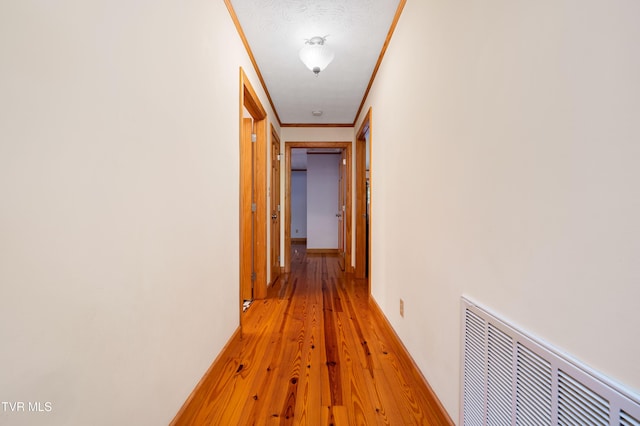 198 Gunbarrel Ln, Butler, TN 37640 - corridor featuring crown molding and light wood finished floors