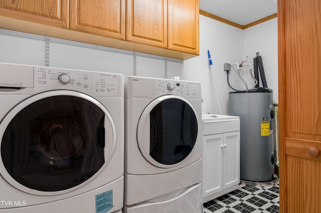 198 Gunbarrel Ln, Butler, TN 37640 - laundry area with washing machine and dryer, electric water heater, cabinet space, crown molding, and tile patterned floors