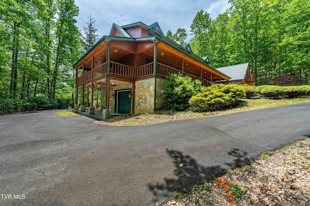 203 Bear Ridge Dr, Butler, TN 37640 - view of front of house featuring stone siding and asphalt driveway