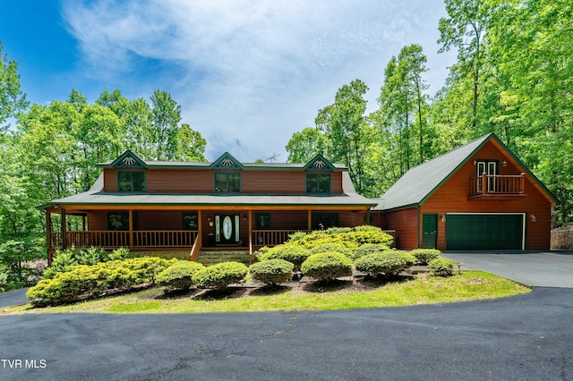 203 Bear Ridge Dr, Butler, TN 37640 - rustic home featuring a garage and covered porch
