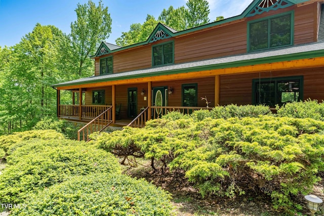 203 Bear Ridge Dr, Butler, TN 37640 - rustic home with covered porch and stairway