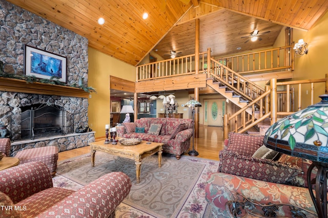 203 Bear Ridge Dr, Butler, TN 37640 - living room featuring high vaulted ceiling, a ceiling fan, wooden ceiling, a fireplace, and stairs