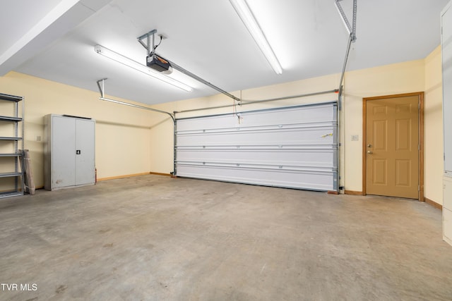 203 Bear Ridge Dr, Butler, TN 37640 - garage featuring a garage door opener