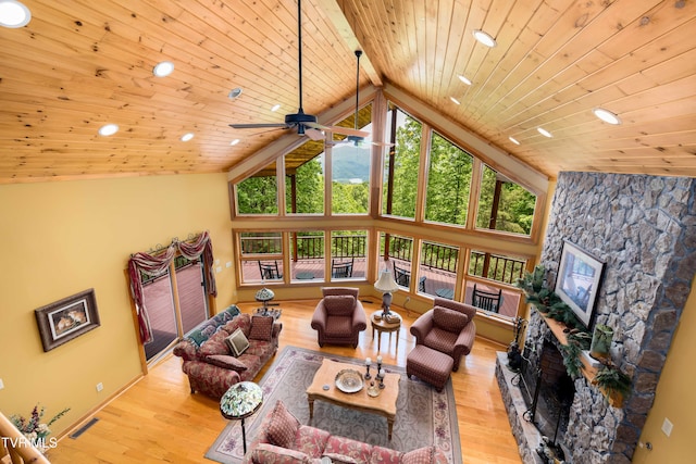 203 Bear Ridge Dr, Butler, TN 37640 - living area with a fireplace, wooden ceiling with exposed beams, wood finished floors, recessed lighting, and ceiling fan