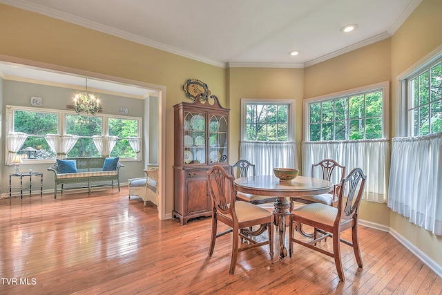 4619 Merrywood Ave, Kingsport, TN 37664 - dining room featuring light wood-style flooring, ornamental molding, recessed lighting, and a chandelier