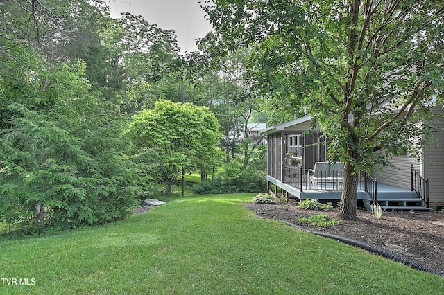 4619 Merrywood Ave, Kingsport, TN 37664 - view of green lawn with a deck and a sunroom