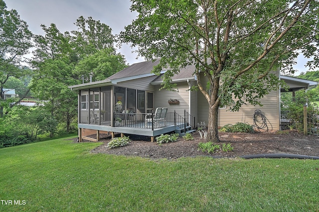 4619 Merrywood Ave, Kingsport, TN 37664 - back of property featuring a sunroom, a yard, a shingled roof, and a deck