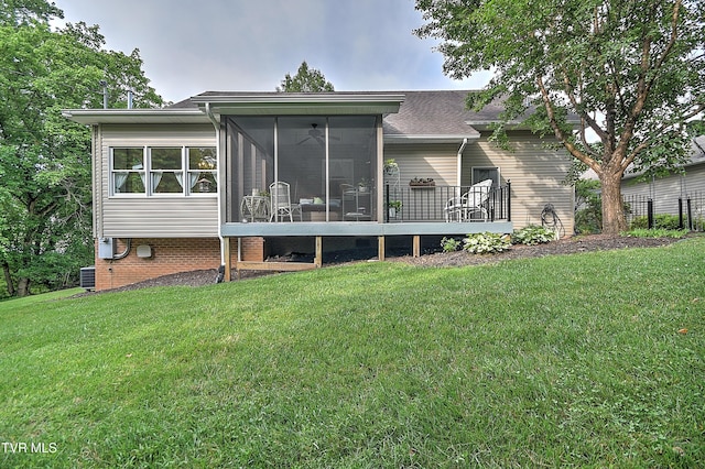 4619 Merrywood Ave, Kingsport, TN 37664 - rear view of house with a lawn and a sunroom