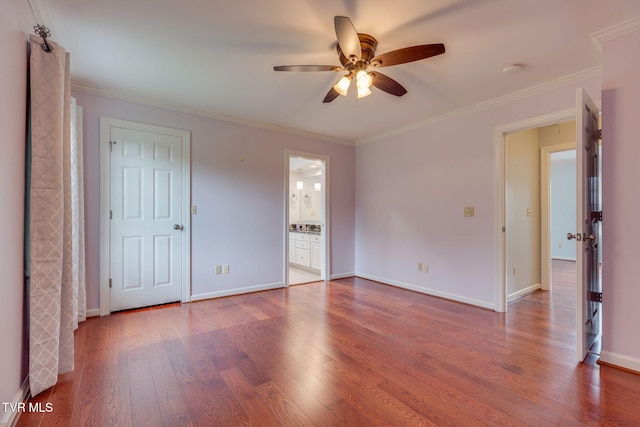 1101 E 8th Ave Unit 5, Johnson City, TN 37601 - unfurnished room with a ceiling fan, wood finished floors, crown molding, baseboards, and a smoke detector