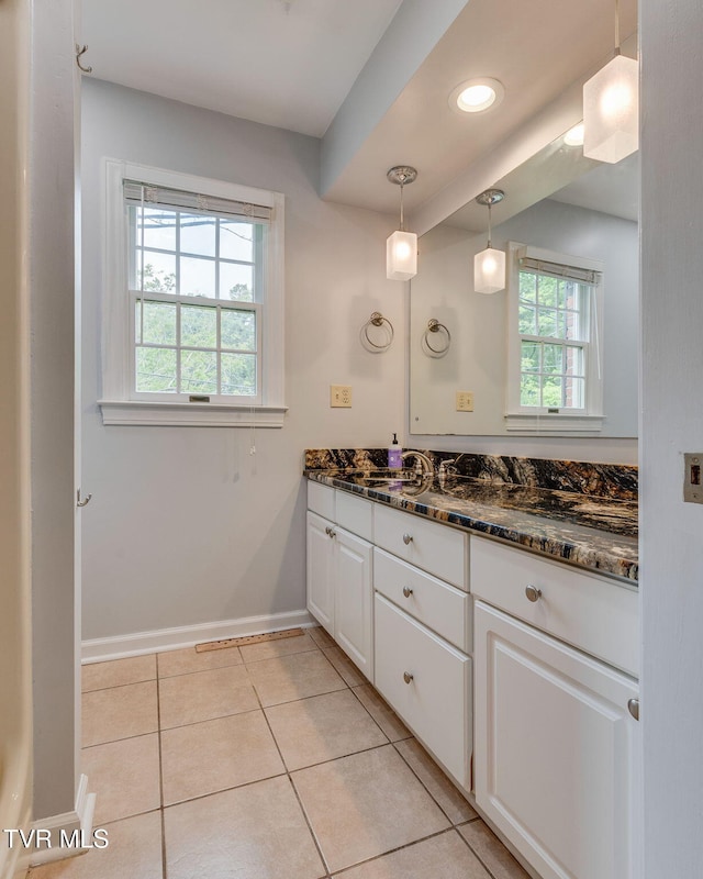 1101 E 8th Ave Unit 5, Johnson City, TN 37601 - bathroom with double vanity, baseboards, tile patterned floors, and recessed lighting