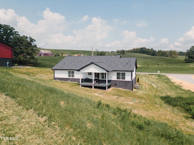 2166 Old Stage Rd, Tusculum, TN 37745 - rear view of property with a deck, a shingled roof, a rural view, and crawl space