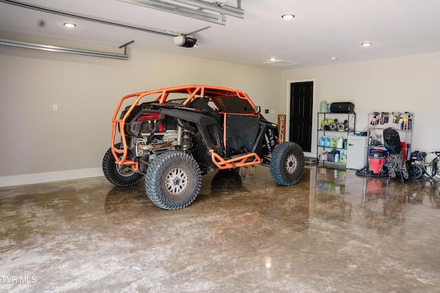 2166 Old Stage Rd, Tusculum, TN 37745 - garage with recessed lighting, a garage door opener, and baseboards
