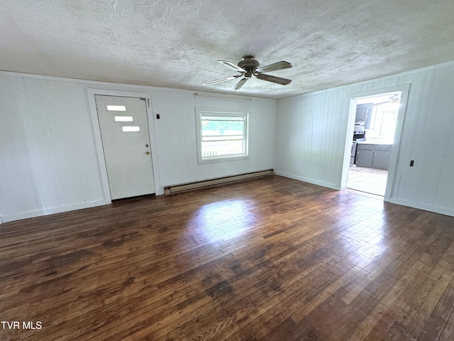 142 Sheryl Turner Rd, Big Stone Gap, VA 24219 - unfurnished living room with a baseboard radiator, a textured ceiling, a ceiling fan, and wood finished floors