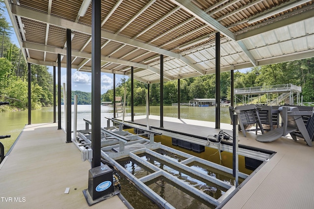 273 Campbell Rd, Butler, TN 37640 - dock with boat lift, a water view, and view of scattered trees