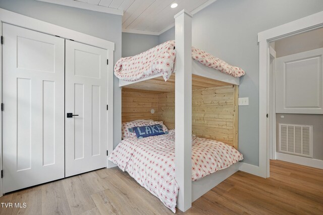 273 Campbell Rd, Butler, TN 37640 - bedroom featuring wood finished floors, baseboards, recessed lighting, crown molding, and a closet