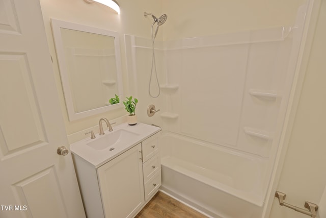 329 Clinch St, Kingsport, TN 37660 - bathroom featuring vanity, shower / bath combination, and wood finished floors