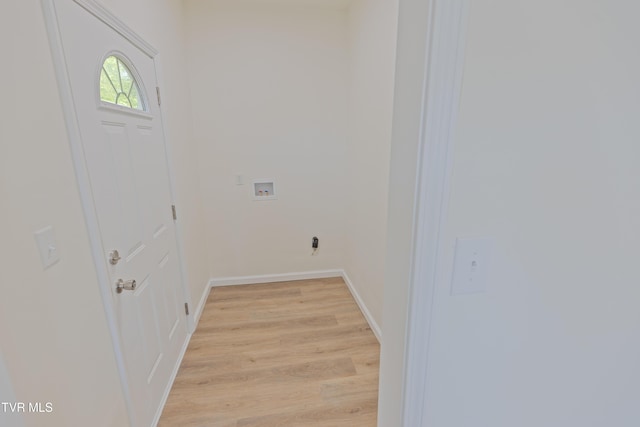 329 Clinch St, Kingsport, TN 37660 - laundry room featuring washer hookup, light wood finished floors, and baseboards