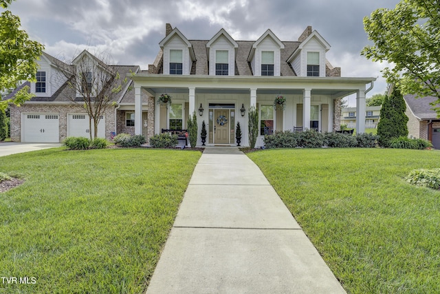 1 Celebration Ct, Johnson City, TN 37601 - cape cod-style house featuring covered porch, a front yard, driveway, and a chimney