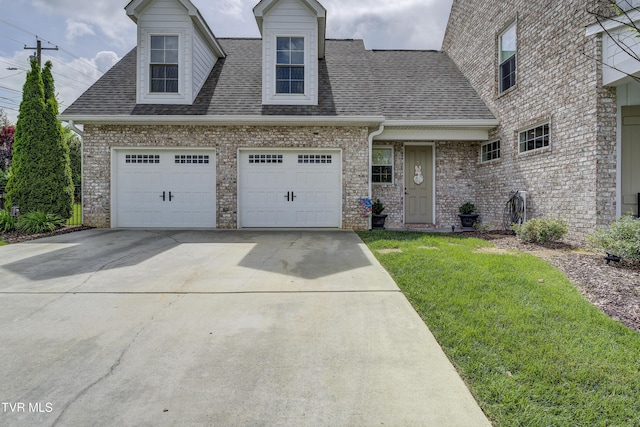1 Celebration Ct, Johnson City, TN 37601 - view of front of property with concrete driveway, a front yard, roof with shingles, and a garage