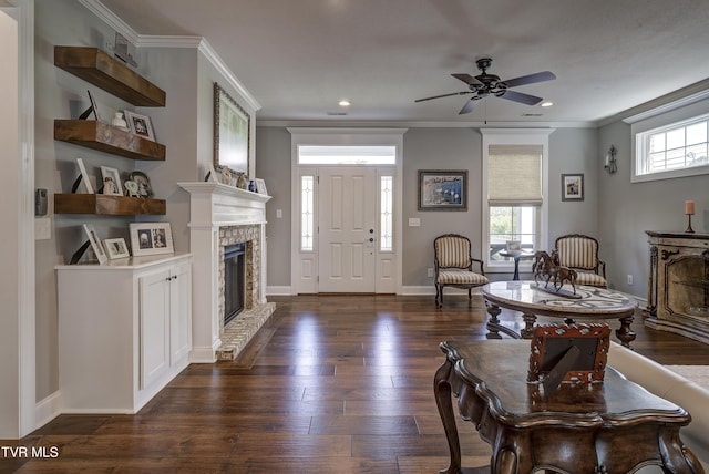 1 Celebration Ct, Johnson City, TN 37601 - entryway with crown molding, healthy amount of natural light, dark wood-style flooring, ceiling fan, and a brick fireplace