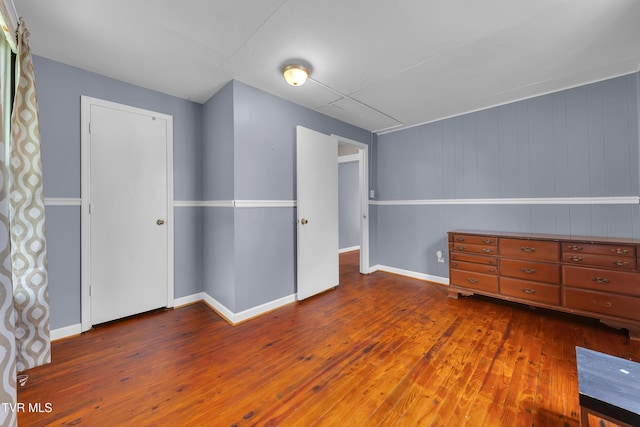 382 Texas Ave, Bristol, VA 24201 - unfurnished bedroom featuring wood-type flooring and baseboards