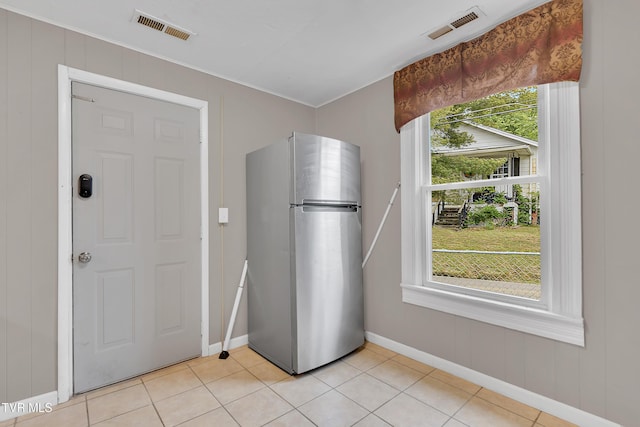 382 Texas Ave, Bristol, VA 24201 - kitchen with freestanding refrigerator, baseboards, and light tile patterned floors