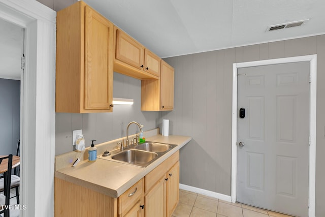382 Texas Ave, Bristol, VA 24201 - kitchen featuring a sink, light brown cabinets, light countertops, light tile patterned floors, and baseboards