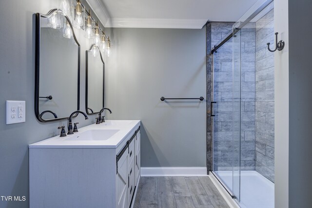 403 Catawba St, Erwin, TN 37650 - full bath with a shower stall, wood finished floors, ornamental molding, baseboards, and double vanity