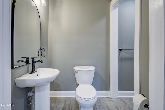 403 Catawba St, Erwin, TN 37650 - half bath featuring baseboards, toilet, and wood finished floors