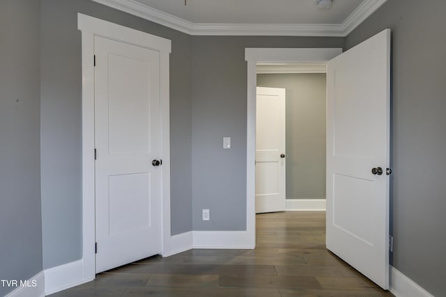 403 Catawba St, Erwin, TN 37650 - unfurnished bedroom featuring baseboards, ornamental molding, and dark wood-style floors