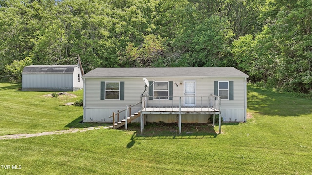 438 Horace Dillow Rd, Limestone, TN 37681 - manufactured / mobile home featuring a front lawn, a wooden deck, and stairway