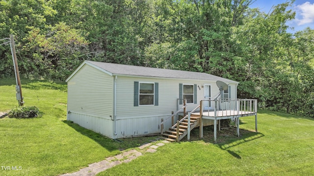 438 Horace Dillow Rd, Limestone, TN 37681 - manufactured / mobile home featuring a wooden deck, a front yard, and stairs