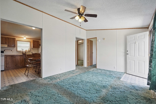 438 Horace Dillow Rd, Limestone, TN 37681 - living room with crown molding, a ceiling fan, a textured ceiling, carpet flooring, and lofted ceiling