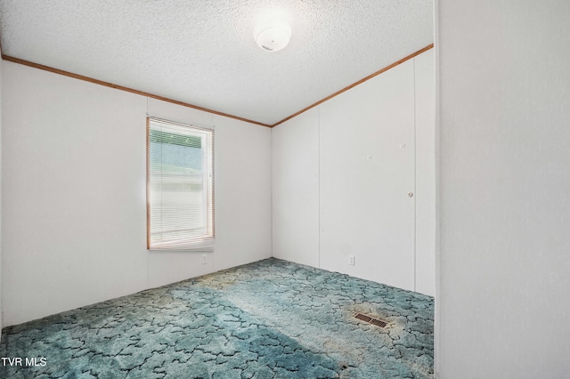 438 Horace Dillow Rd, Limestone, TN 37681 - carpeted empty room with ornamental molding and a textured ceiling