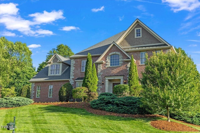 114 Highland Gate Dr, Johnson City, TN 37615 - view of front facade featuring brick siding, a front yard, and roof with shingles
