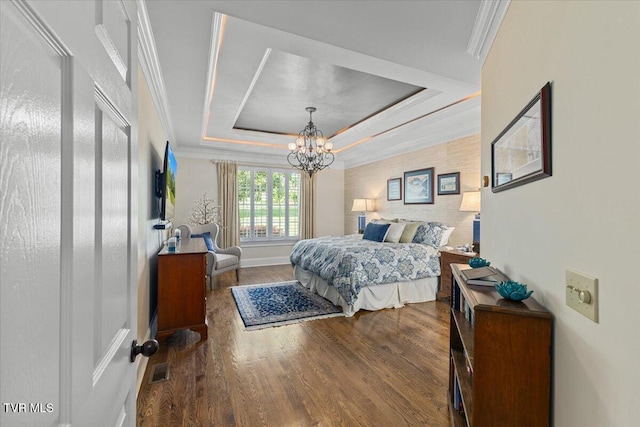 114 Highland Gate Dr, Johnson City, TN 37615 - bedroom with a chandelier, a raised ceiling, wood finished floors, ornamental molding, and baseboards