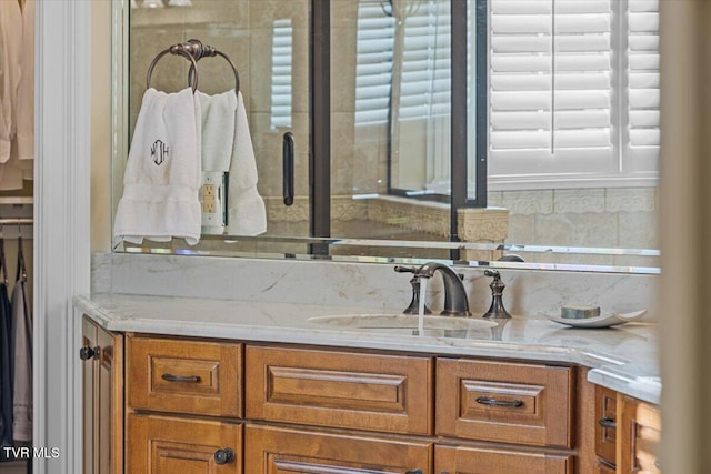 114 Highland Gate Dr, Johnson City, TN 37615 - bathroom with vanity and tasteful backsplash