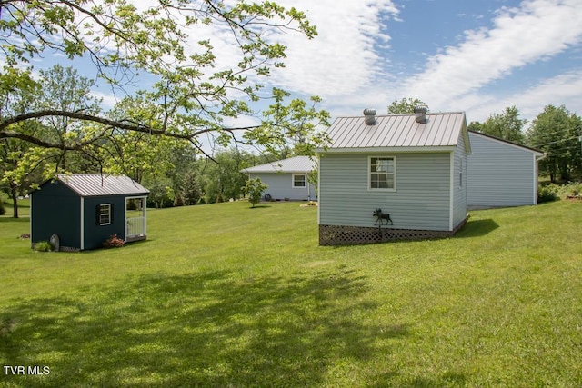 14227 Wellbridge Dr, Meadowview, VA 24361 - view of grassy yard with an outbuilding