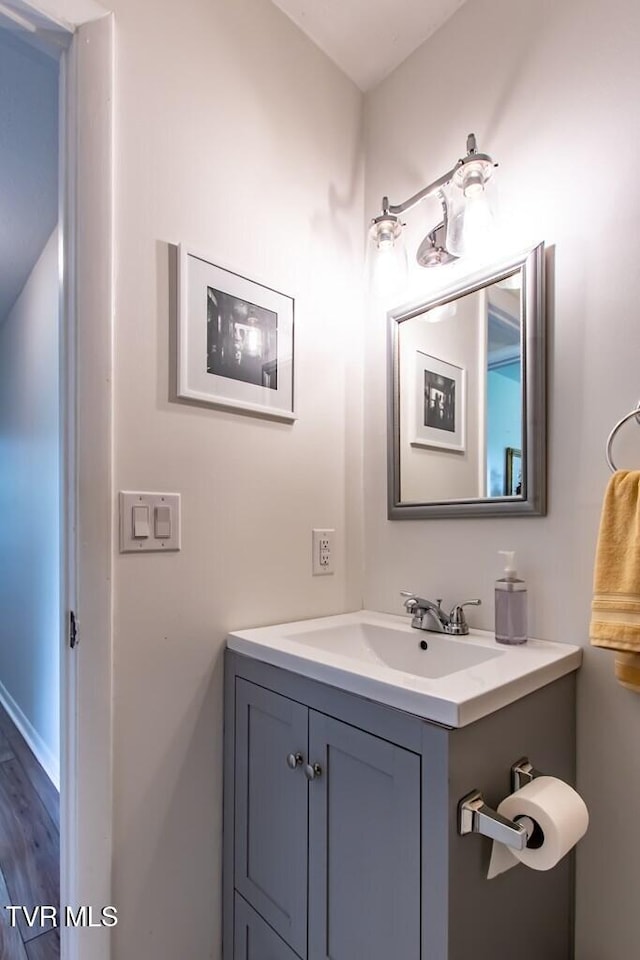 14227 Wellbridge Dr, Meadowview, VA 24361 - bathroom featuring vanity and wood finished floors