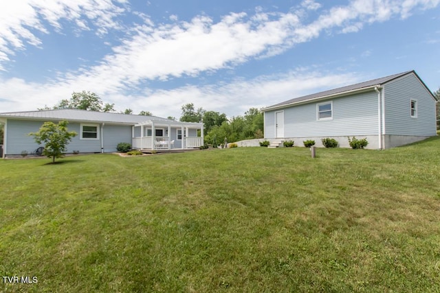 14227 Wellbridge Dr, Meadowview, VA 24361 - rear view of property with a yard and a porch