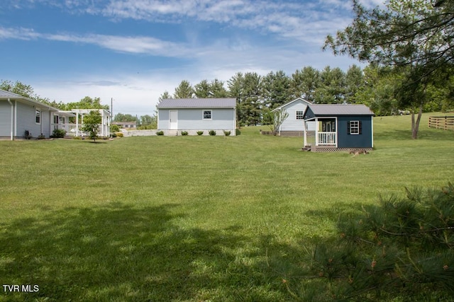 14227 Wellbridge Dr, Meadowview, VA 24361 - view of grassy yard with an outdoor structure