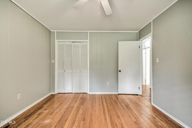 28 Kingsbridge St, Bristol, TN 37620 - unfurnished bedroom featuring wood finished floors, baseboards, a closet, ornamental molding, and ceiling fan