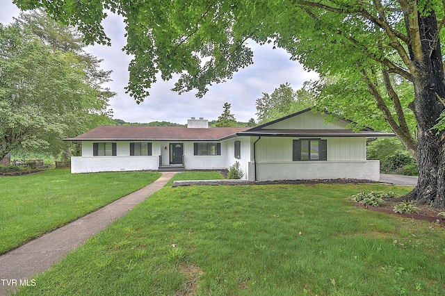 28 Kingsbridge St, Bristol, TN 37620 - single story home featuring a chimney, a front lawn, and brick siding
