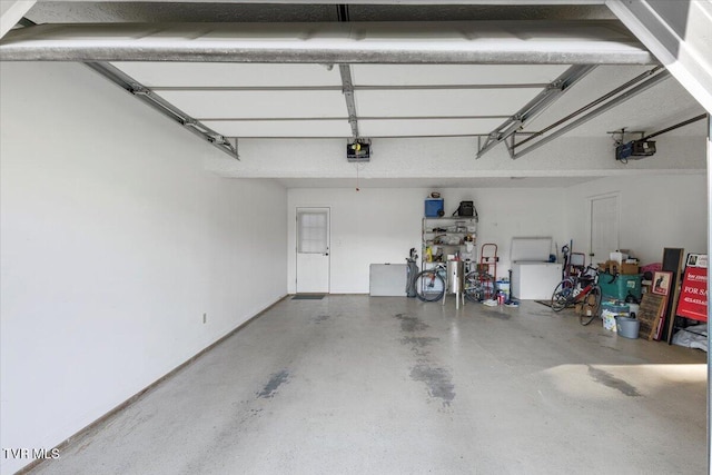 124 Highland Hills Dr, Gray, TN 37615 - garage featuring a garage door opener
