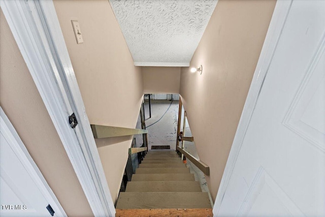 124 Highland Hills Dr, Gray, TN 37615 - stairway with a textured ceiling