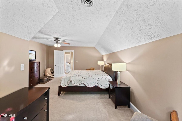 124 Highland Hills Dr, Gray, TN 37615 - bedroom with a textured ceiling, light colored carpet, baseboards, ceiling fan, and lofted ceiling