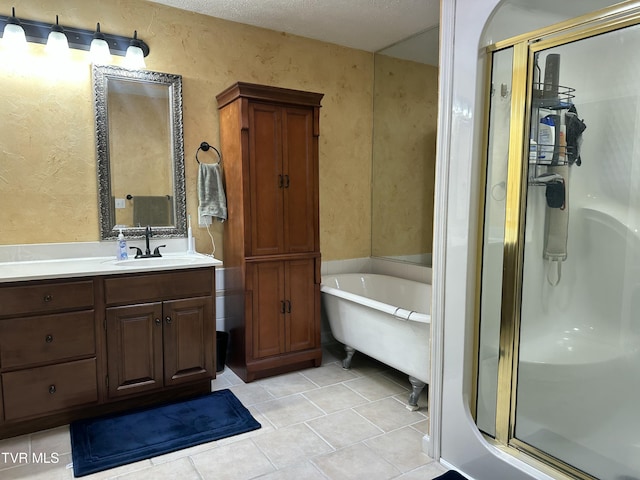 390 Springdale Dr, Bristol, TN 37620 - bathroom featuring a textured wall, a stall shower, tile patterned flooring, a freestanding tub, and vanity