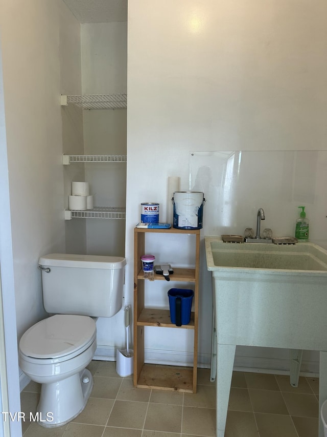 390 Springdale Dr, Bristol, TN 37620 - half bath featuring toilet and tile patterned floors